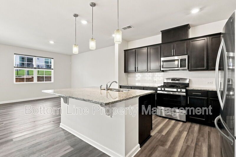 Spacious 3-Bedroom Raleigh Townhome with Screened Porch & 1-Car Garage property image