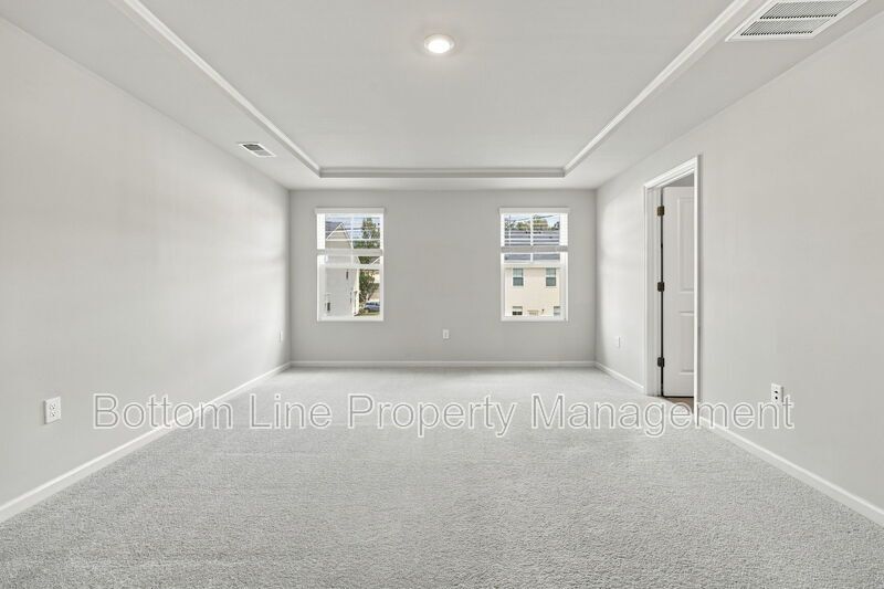 Stunning 3-Bedroom Townhome with Garage & Screened Porch – In Pool Community property image