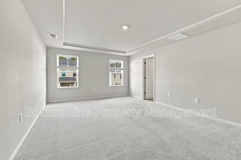 Stunning 3-Bedroom Townhome with Garage & Screened Porch – In Pool Community property image