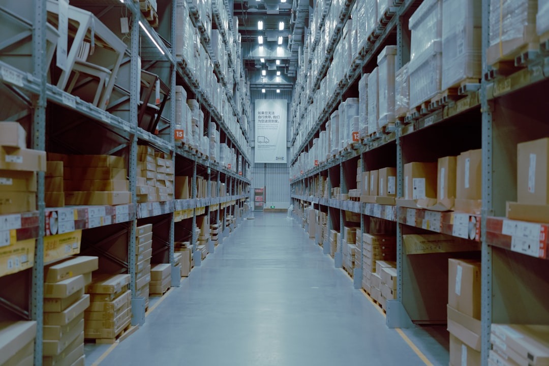 Temperature-controlled warehouse aisle with tall storage racks