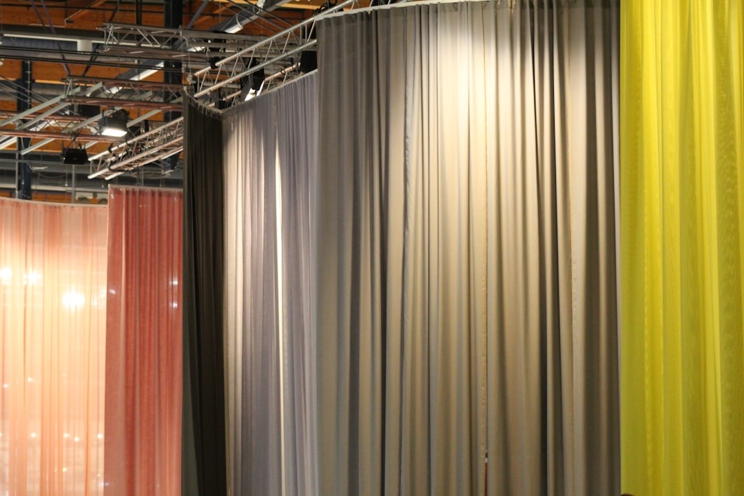 Heavy-duty insulated vinyl curtain wall dividing a warehouse